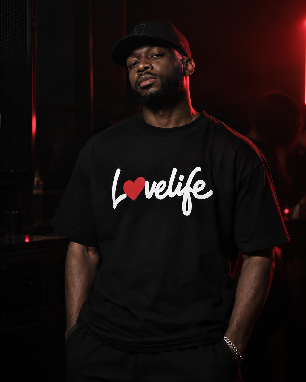Men wearing Lovelife merch: Logo Tee · Cap